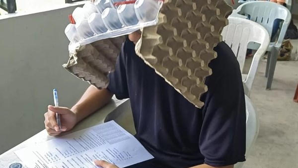 Philippines: Student 'anti-cheating' exam hats go viral | News Article