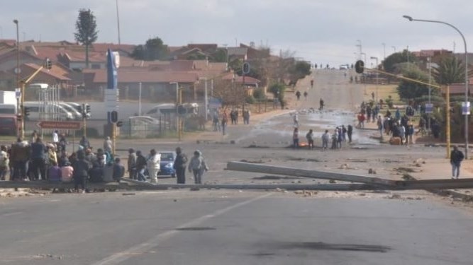 Kagiso residents block roads in protest against illegal mining, crime | News Article