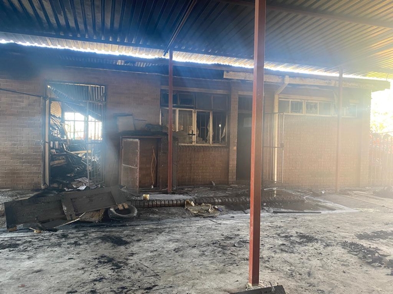NW MEC slams torching of secondary school | News Article