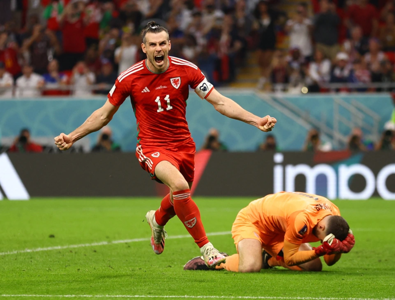 Qatar 2022 - Late Bale penalty earns the Dragons a draw | News Article
