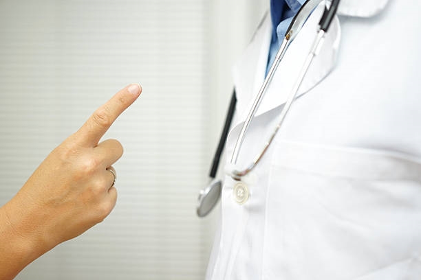 Verdagtes vas ná hul dokter probeer afpers vir geld | News Article