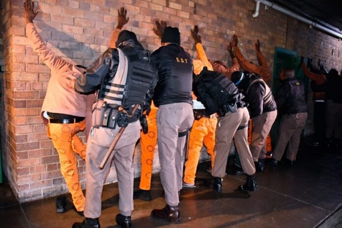 Hawks raid prison cells after extortion messages traced to inmates | News Article