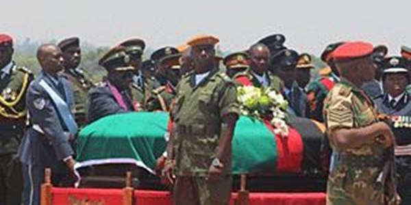 Thousands of Zambians receive president's body at airport | News Article