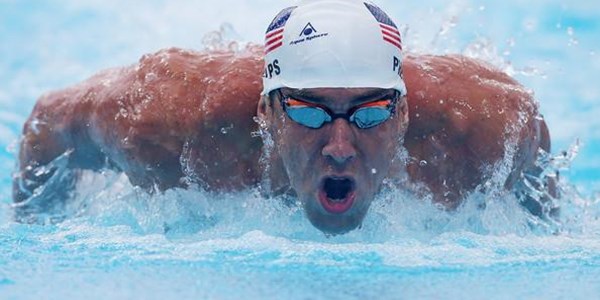 Phelps clocks blistering time in return | News Article