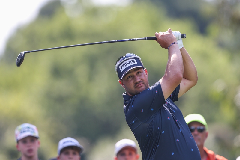 Lawrence sets new course record on day one | News Article