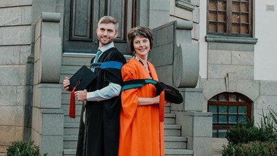 Thirty years apart, mother and son graduate and receive same medal | News Article