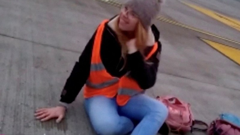 Climate activists glue themselves to airport runway Climate activists glue themselves to airport runway | News Article