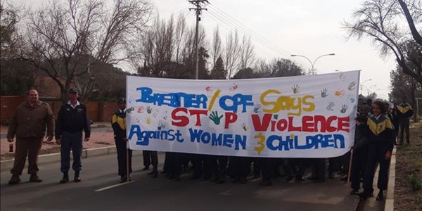 Brebner marches against violence against women and children | News Article