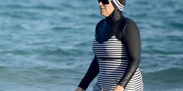 Top French court temporarily suspends burkini ban | News Article