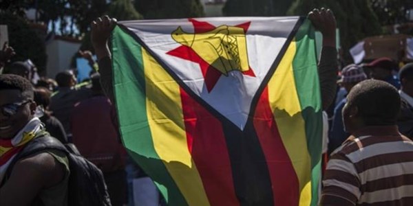 Anger as Mugabe snapped eating Lays at his birthday | News Article