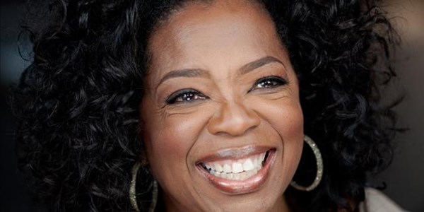 Oprah tells SA that 'each one must teach one