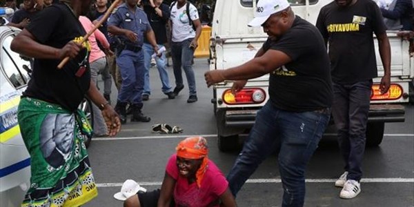 VIDEO: #ANC suspends man who assaulted woman at #LuthuliHouse march | News Article