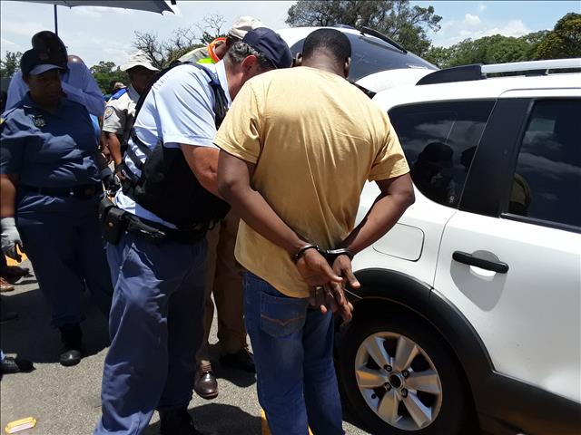 'Take him in' - Man arrested at roadblock manned by Bheki Cele | News Article