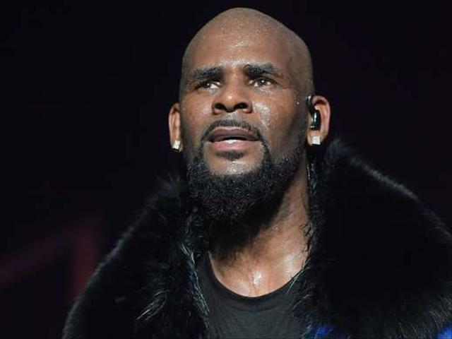 R.Kelly charged with abuse | News Article