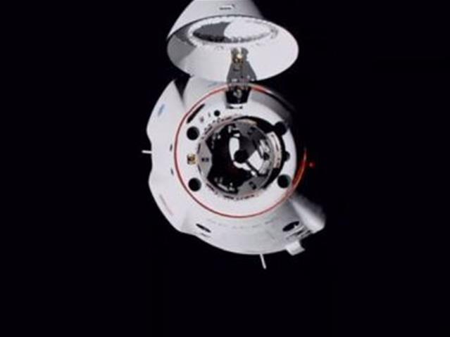 SpaceX Crew Dragon craft docks with ISS | News Article