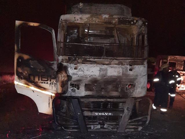 Trucks torched in FS | News Article