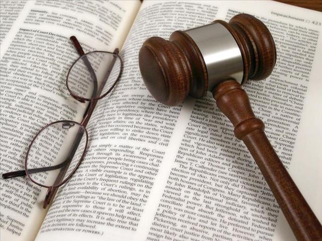 MMC and wife in court for illegal firearms | News Article