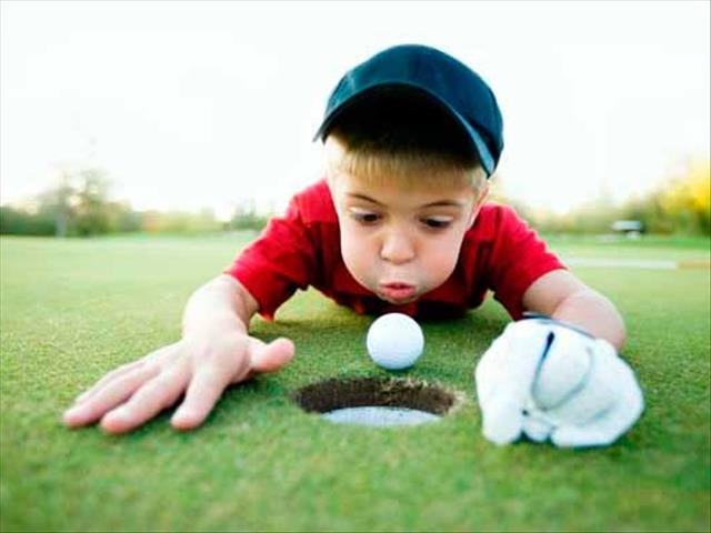 Weird Wide Web - 5 year old sinks hole in one | News Article