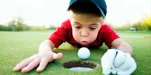 Weird Wide Web - 5 year old sinks hole in one | News Article