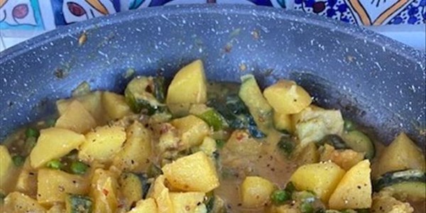 Ilse Cooks the Books: Potato and Pea Curry | News Article