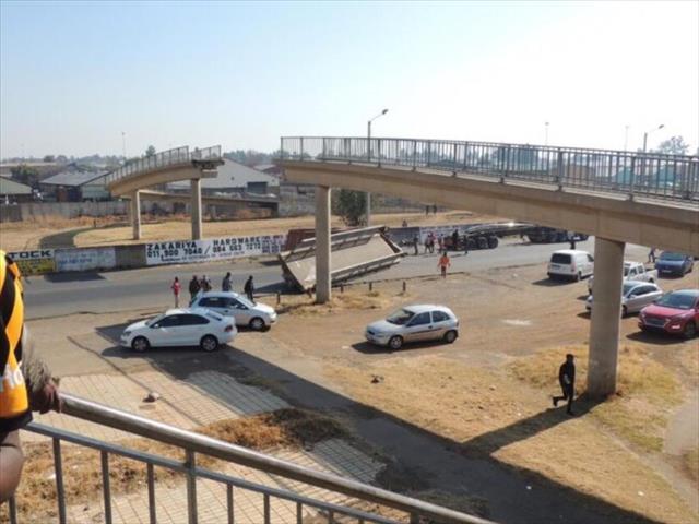 Bridge collapses onto truck | News Article