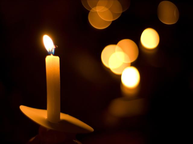 Candlelight memorial for slain NW officer | News Article
