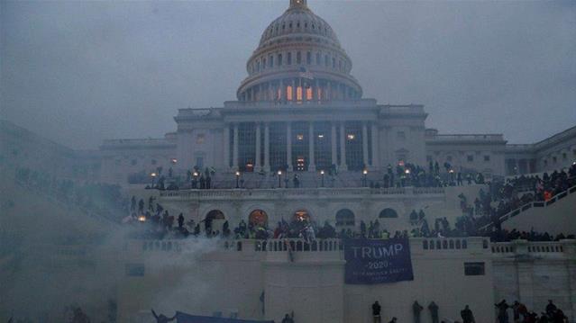 'Officer dies following clash with pro-Trump mob' | News Article