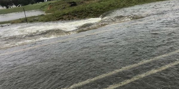 Flash floods implode NC road | News Article