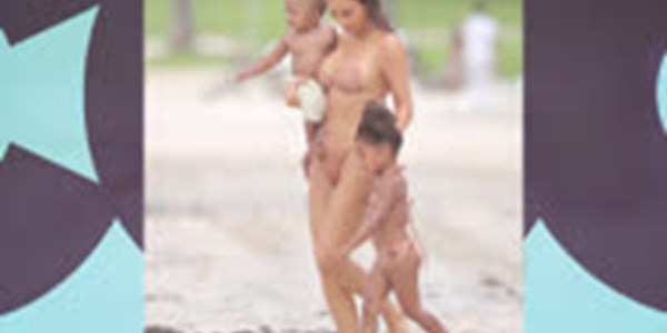 Kim Kardashian flaunts body in tiny bikini after losing pregnancy weight  | News Article