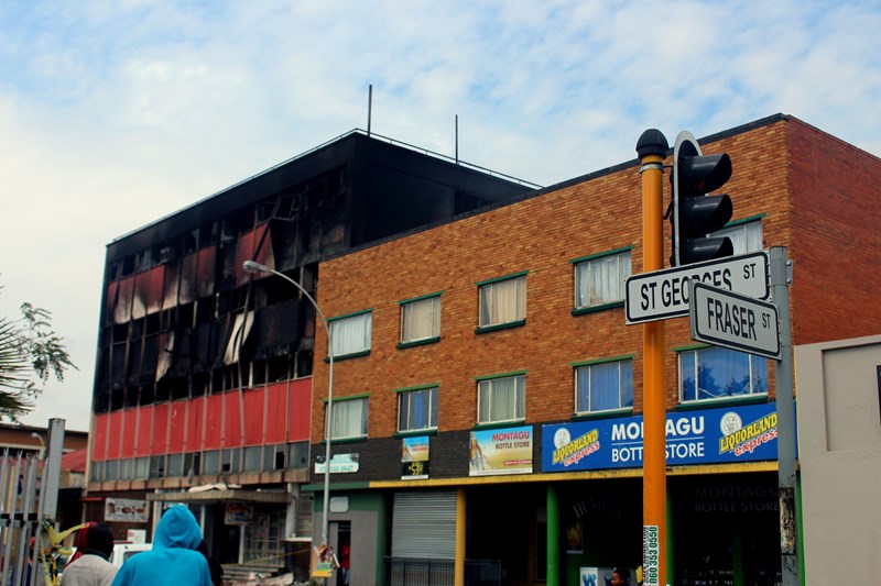 PICTURES Torched Bloemfontein warehouse still smouldering OFM