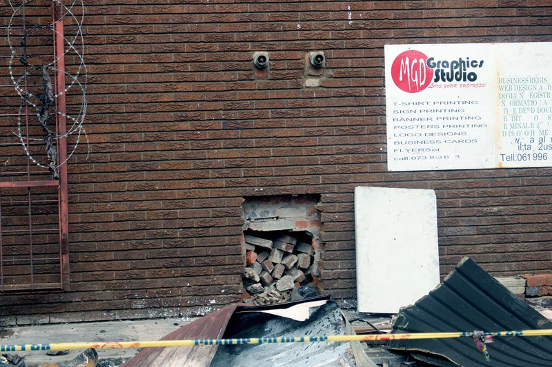 PICTURES Torched Bloemfontein warehouse still smouldering OFM