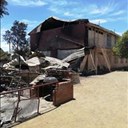 The damage to the schools' hostel building can be seen on this file photo taken before demolition. 